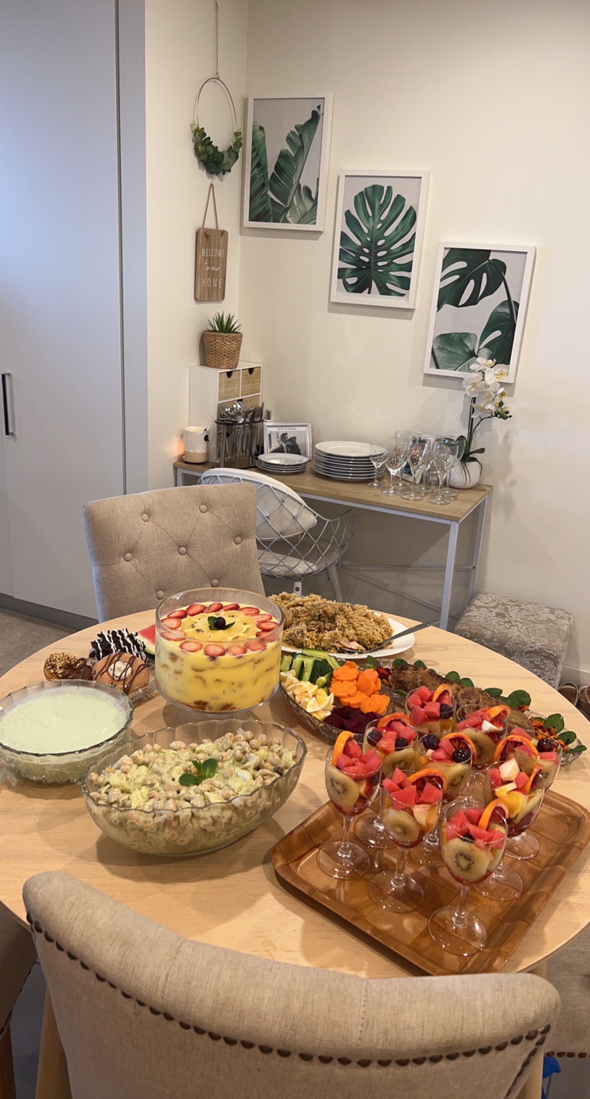 A table with lots of plates of food neatly arranged and displayed