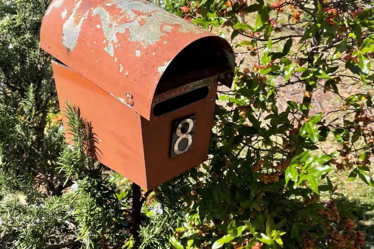 Letter box - patina red and slightly worn, number 8 on box